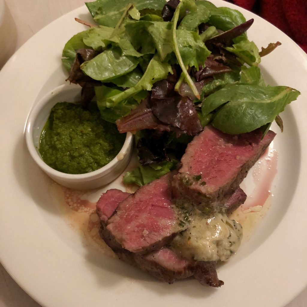 Dry-aged strip steak at the Pine Room, seared pretty pink medium-rare exactly as ordered.