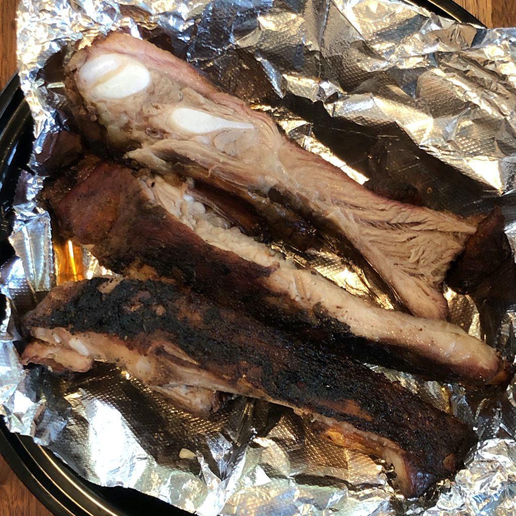 Shirley Mae smoked these meaty pork ribs on big black grills on the sidewalk out front.