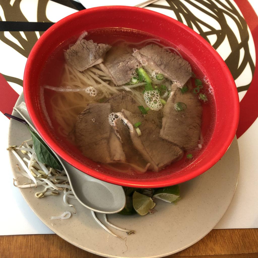 Deeply aromatic beef broth, tender thin-sliced beef, tender noodles and green onions come together in NamNam's savory, consoling beef noodle pho.
