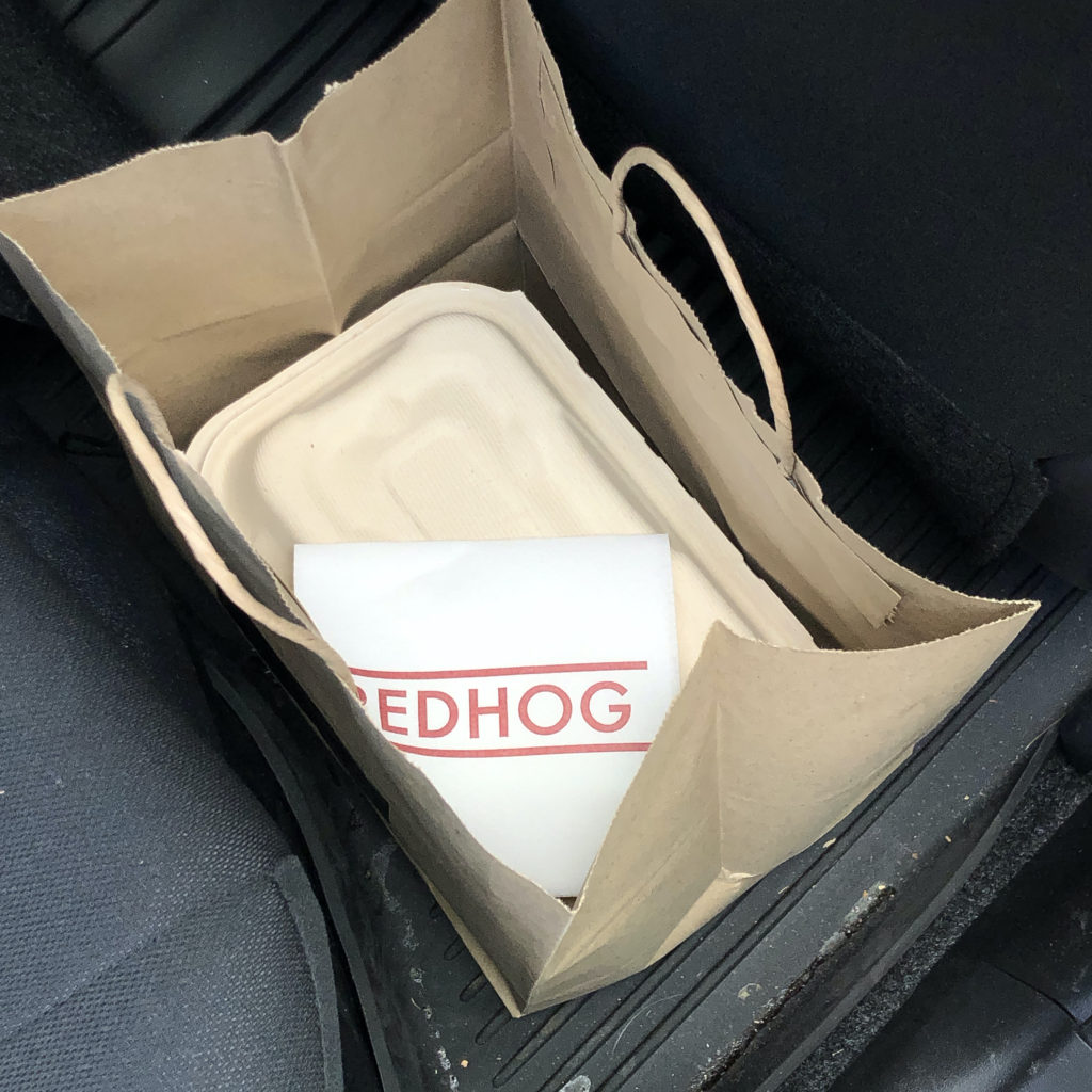 Bag o' Taco Tuesday tacos from Red Hog, packed in the back seat and ready to go!