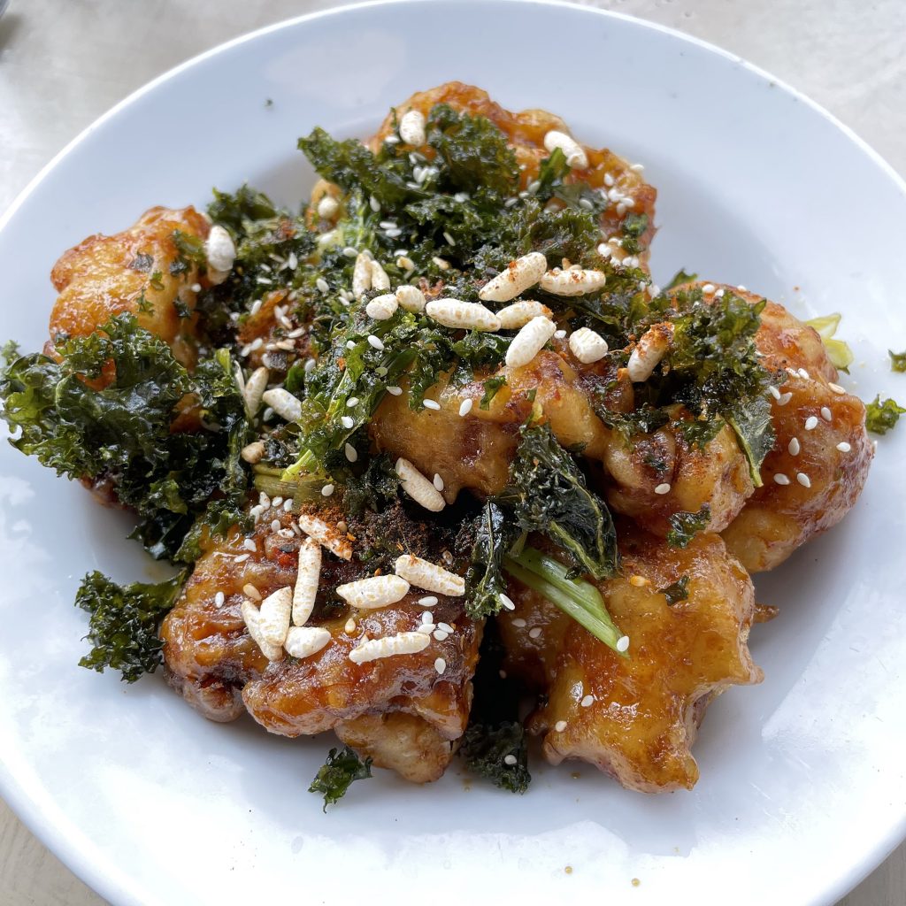 Naive's tempura cauliflower appetizer with kale garnish was a creatively imagined delight.